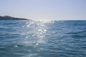 Sunlit ocean waves, Paphos, Cyprus – November 23, 2024..
