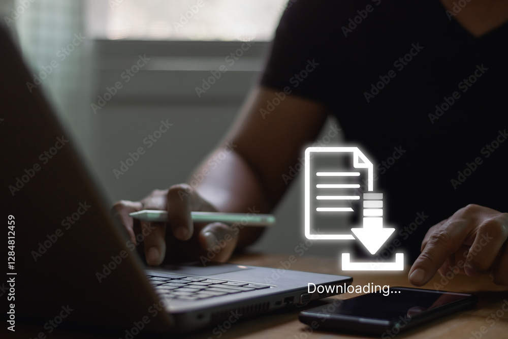 Leinwandbilder Businessman download files or install software on laptop computer and smartphone, cloud storage technology, data backup, cyber security, document downloading. Transfer files data concept.