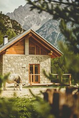 Alpine Cabin Serenity: A quaint cabin blends seamlessly with the majestic mountain backdrop, with a gentle cow, creating a scene of idyllic rural charm.