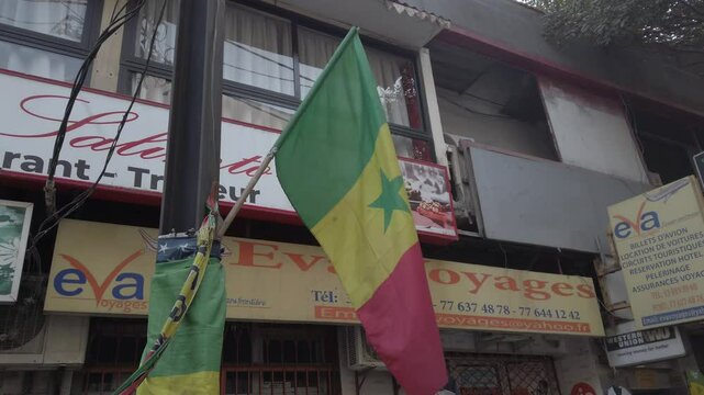 Senegal flag flying in the wind in Dakar, Senegal, West Africa