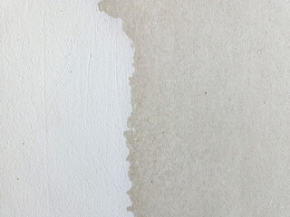 wall partially putty white partially gray Finishing work in the premises, leveling of walls for...