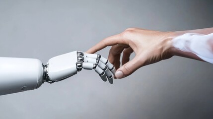 Robotic hand and human hand touching; future tech collaboration