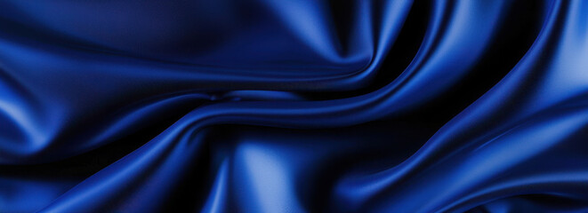 Obraz premium Smooth deep blue fabric with elegant folds and soft texture