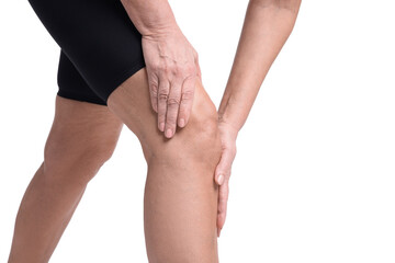 Woman suffering from pain in her knee on white background, closeup