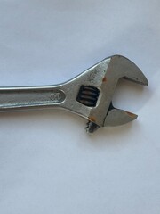 Silver wrench tool on a white background 