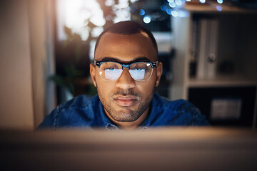 Night, businessman and glasses with computer research for publication deadline, creative planning or story information. Journalist, african person or reflection with plot development or proofreading