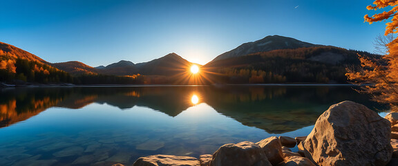 Stunning Autumn Sunset over Calm Mountain Lake with Crystal Clear Water and Golden Trees