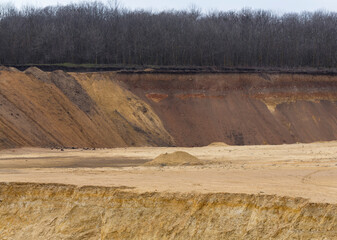 A large sand quarry. The place of sand extraction on an industrial scale.