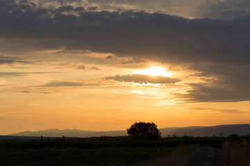 Sunset over the Balkans. The stillness and the dusk. Cirrus clouds in a crimson sky.