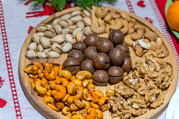 Various types of nuts are on a plate