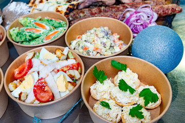 Festive feast with vibrant dishes featuring salads and appetizers