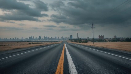 Fototapeta premium abandoned blacktop highway leading towards the city skyline