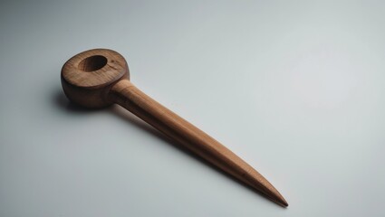 Image of a wooden stake against a white backdrop