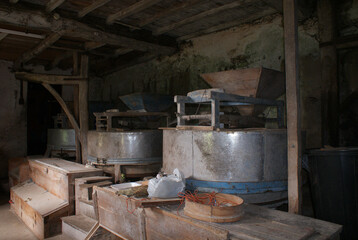 Traditional old water mills, flour mills, made of wood and metal for producing flour and animal...