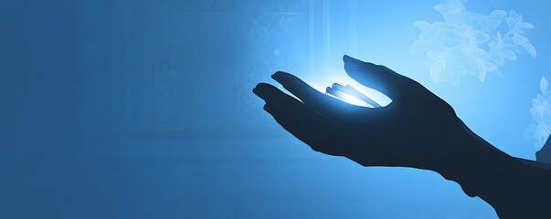 Silhouetted hands hold light in a blue dreamy scene