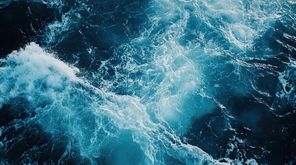 Fototapeta premium Serene blue ocean waves under a bright sun, high-contrast water surface, tranquil seascape with natural beauty.
