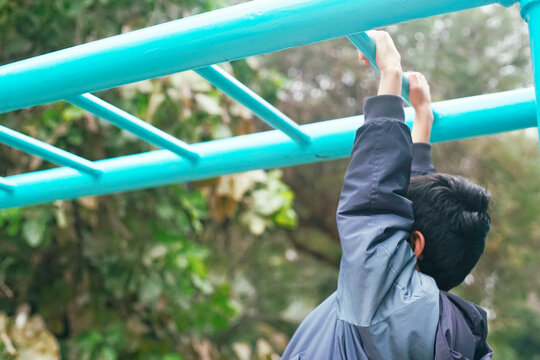 Child having fun playing and exercising outdoors