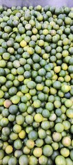 Fresh Green Lime Stacked in a Pile – Organic and Vibrant Vegetables
