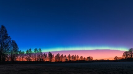 Stunning Northern Lights over a Tranquil Winter Landscape at Dusk