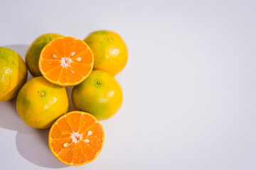 An orange placed on the table, rich in antioxidants, helps slow aging, boosts collagen production,...