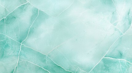 Fototapeta premium Smooth aqua marble texture with subtle veining in soft green tones ideal for backgrounds, wallpapers, and various design projects showcasing elegance
