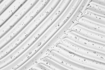 Gel serum texture. Clear cream cosmetic background. Skin care, beauty product with bubbles closeup