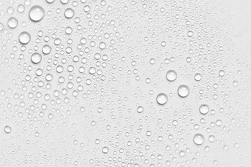 Water drops texture background. Spray, liquid droplets on gray surface