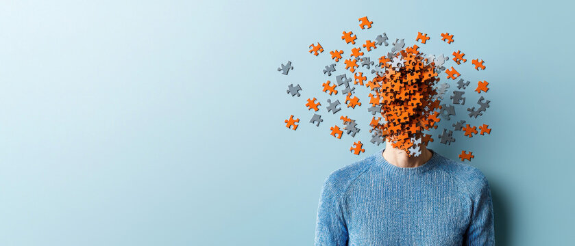 Conversion disorder psychology cognitive FND. Surreal image of a person with a head made of flowers against a blue background.