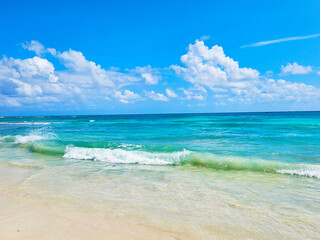 Tropical beach with blue sky and turquoise water