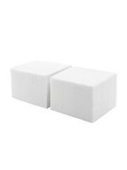 A couple of packs of square paper napkins are stacked side by side on a white background. Photo. View from above.