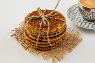 Enjoying caramel waffles on National Caramel Day at a cozy cafe