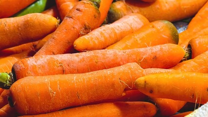 Close-up of Freshly Harvested Carrots Displaying Vibrant Orange Hue and Texture