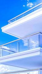 Obraz premium Modern building balconies, clear sky, clouds, architectural design, real estate