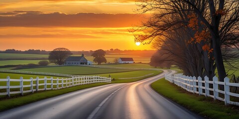 A picturesque countryside road winding through lush green fields at sunset, with warm golden light reflecting on the path, creating a peaceful and scenic rural landscape full of serenity

