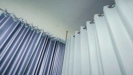 Hospital privacy curtains in patient room for medical examination