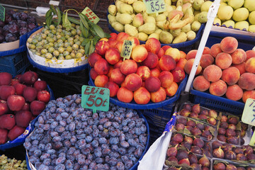 Vibrant fruit display at local market offers fresh seasonal produce