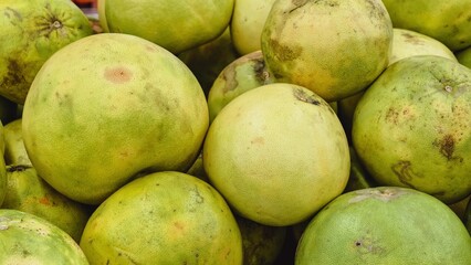 Fresh Pomelos Displayed in Bulk, Promoting Healthy Eating and Vibrant Produce