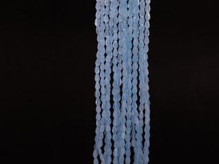 Colorful glass beads made in glassblowing workshop. Variety of shapes and colors to make a bead...
