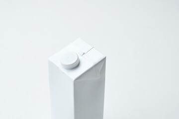 Simple White Carton With a Screw Cap on a Plain Background Highlighting Minimalist Design Aesthetics