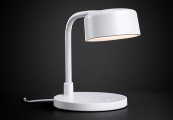 White modern desk lamp with a curved arm and a round base on a dark background. The lamp is illuminated, casting a soft light