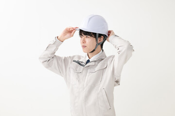 作業服を着た男性　ヘルメット　作業員