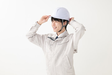 作業服を着た男性　ヘルメット　作業員