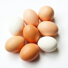 Top-Down View of Mixed Brown and White Chicken Eggs on White Background