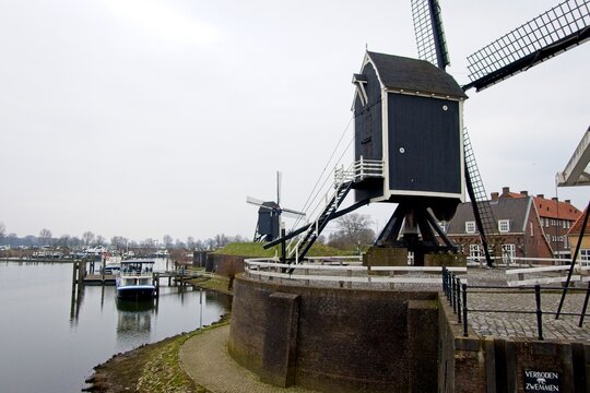 Heusden Netherlands - 15 February 2025 - Windmills on the walls of the fortified city of Heusden in Noord Brabant in the Netherlands