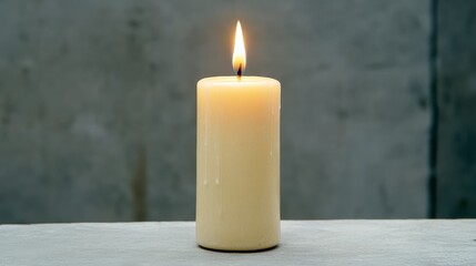 Lit Off White Candle On Gray Surface