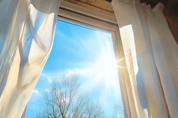 Window is open wind blows curtain sun shining through window blue sky background © SEUNGJIN