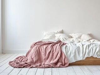 Cozy bedroom with warm bedding accents.