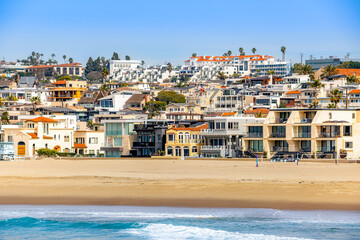 Hermosa Beach, California - Daytime, sunny beach front homes, walkways, neighborhoods, real estate in the South Bay with blue skies and clear views 