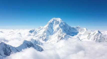 Obraz premium Mountain Top with Serene Clouds on Crystal-Clear Blue Sky