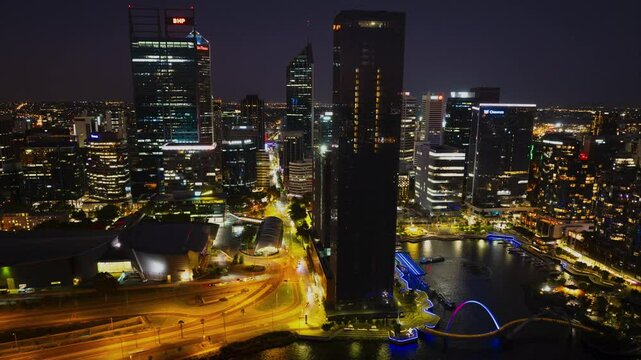 4k Aerial Drone footage fast moving cars , boats, ferries and traffic through Perth City, Elizabeth Quay, Western Australia